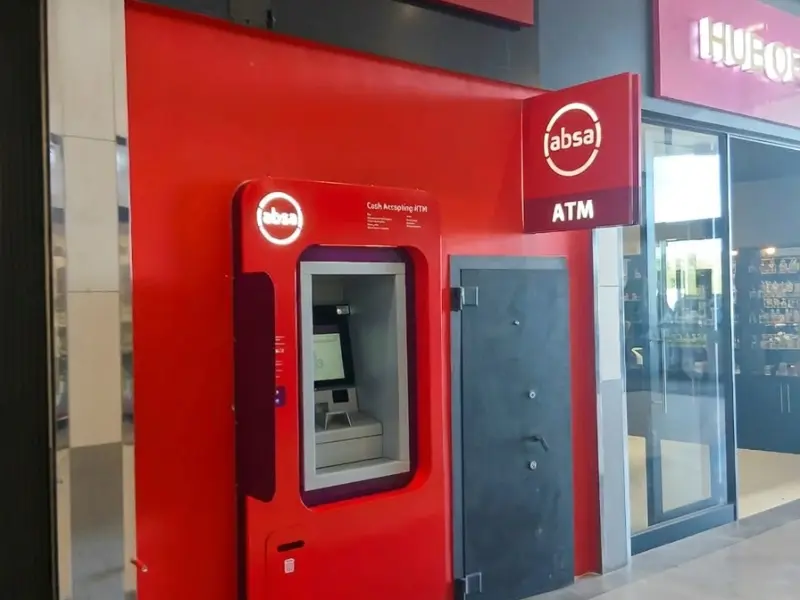 Illuminated Absa ATM surround and fascia sign at a shopping centre