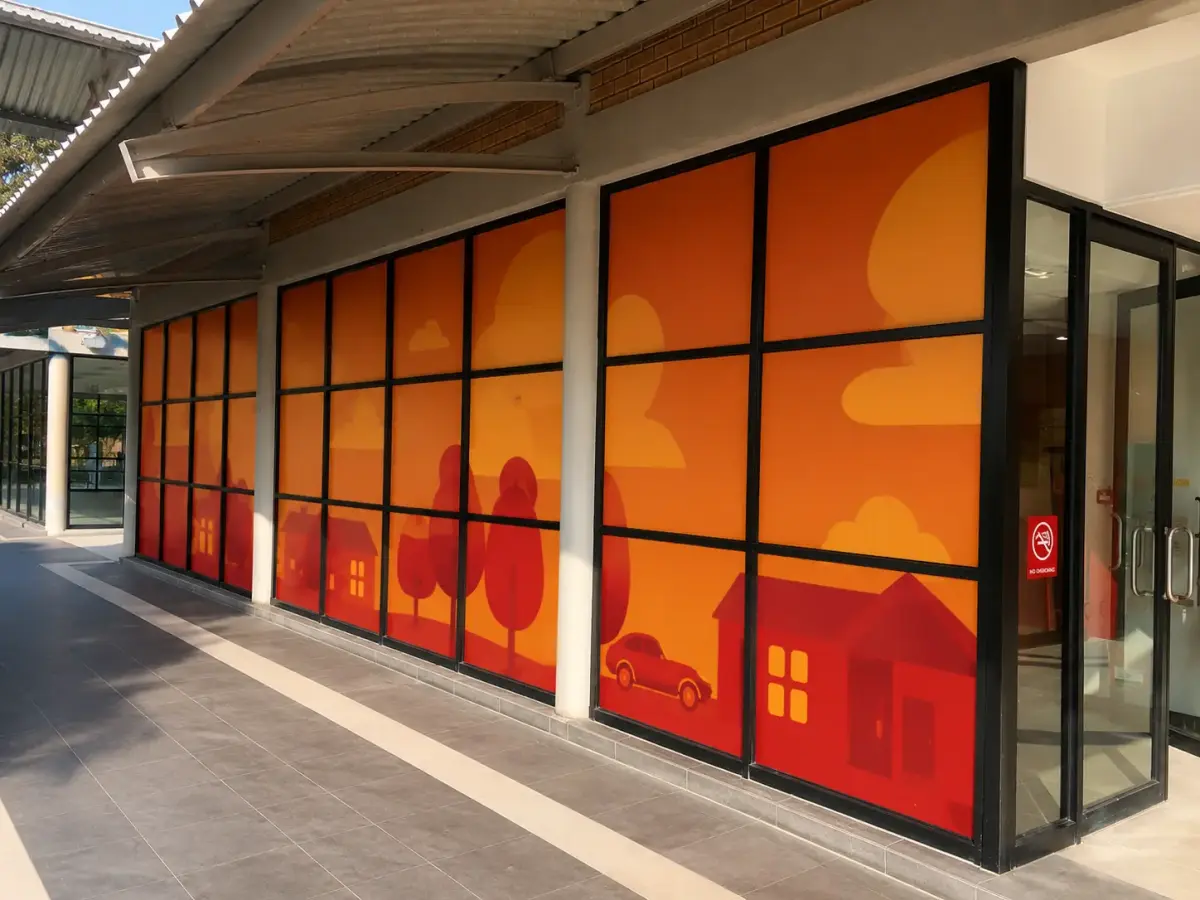 Printed window graphics along an Absa branch frontage