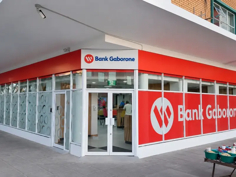 Bank Gaborone branch signage, push-through illumination with contravision and perforated window film