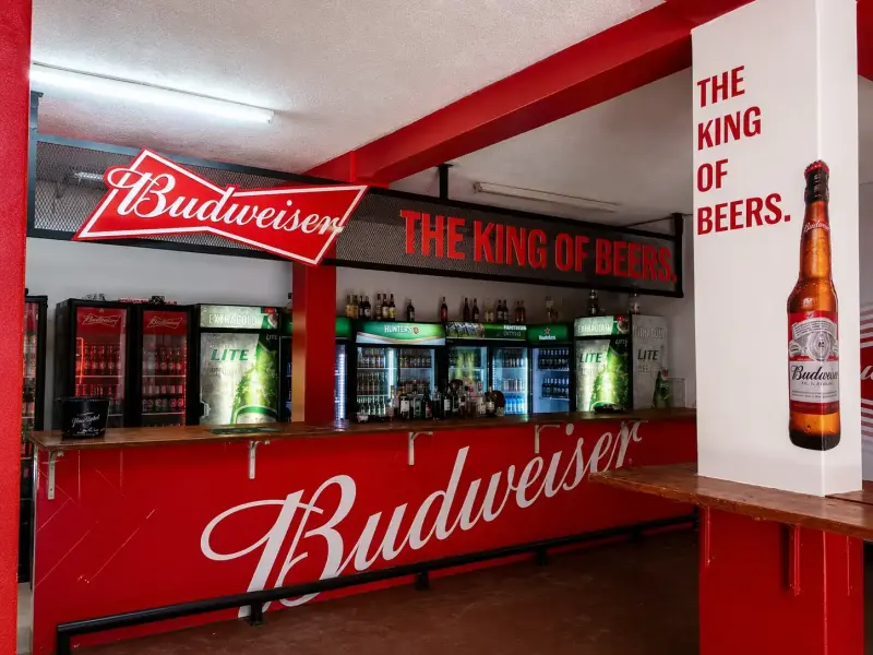 Budweiser branded bar counter and fascia in a licensed venue