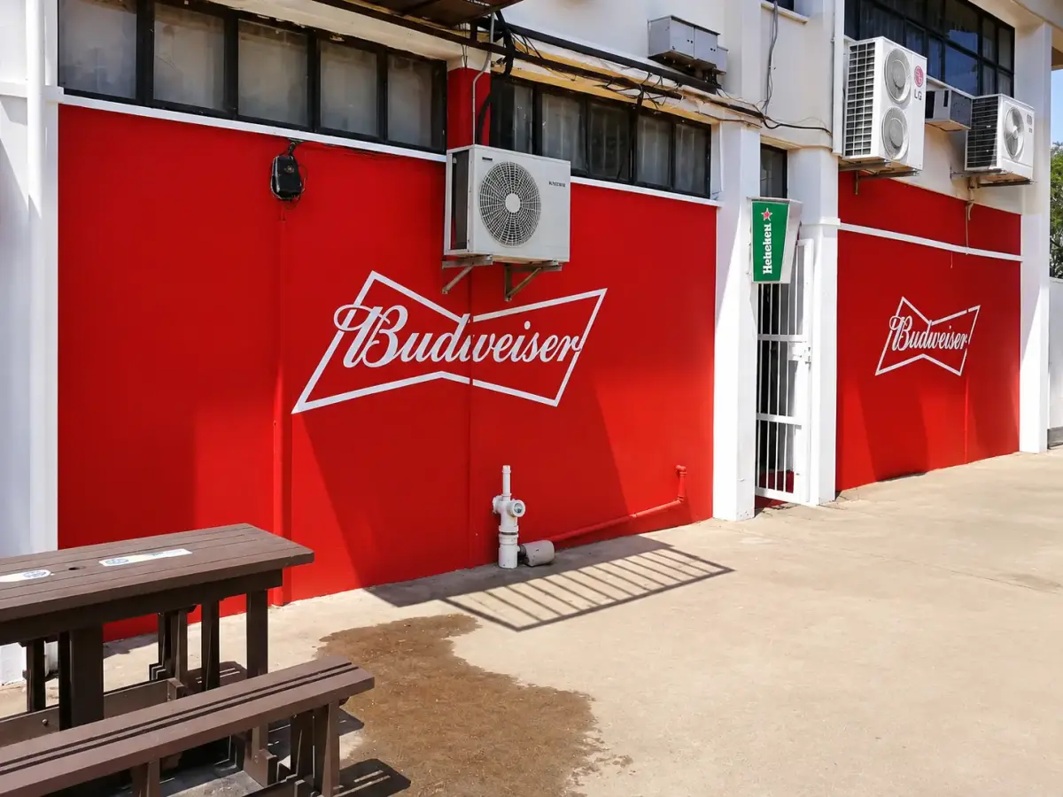 Painted Budweiser wall graphics on a building exterior
