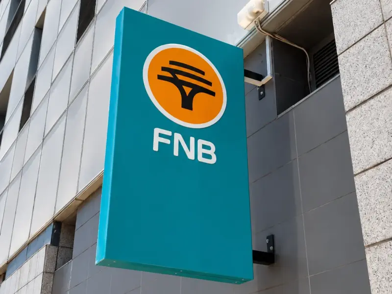 Projecting FNB blade sign mounted on a building facade