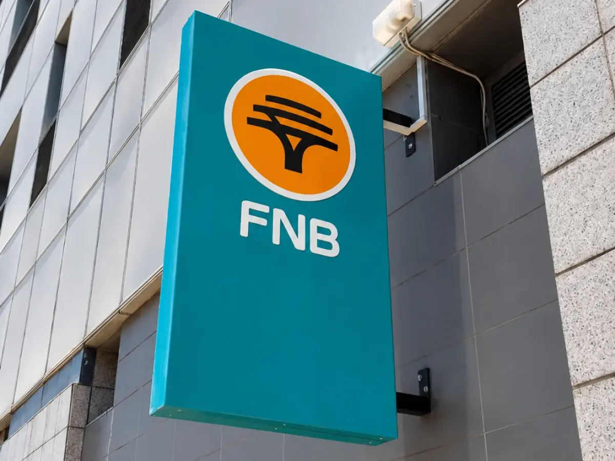 Projecting FNB blade sign mounted on a building facade