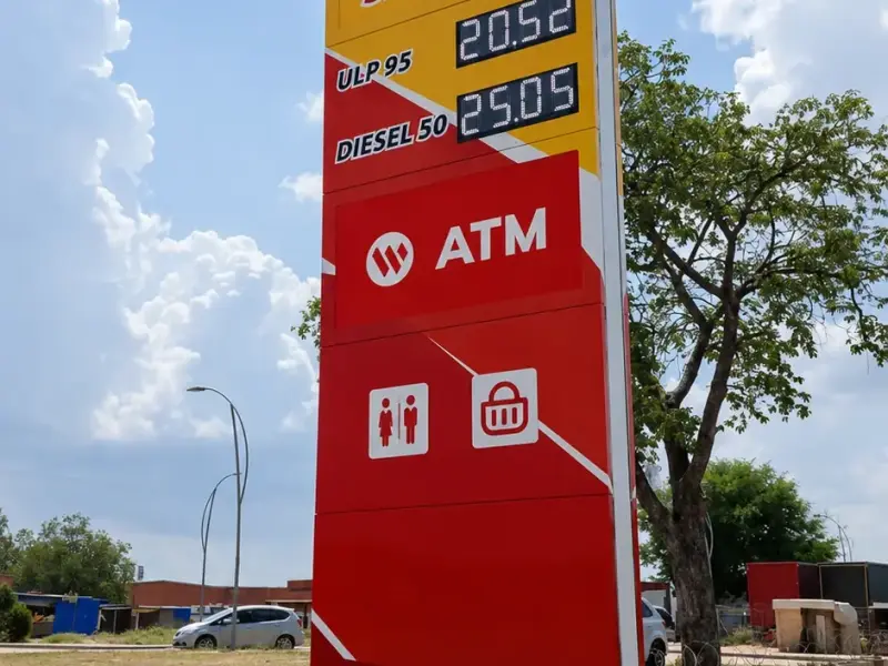 Kwena Nokeng Oil pylon sign with fuel price display, Express Shop and ATM panels