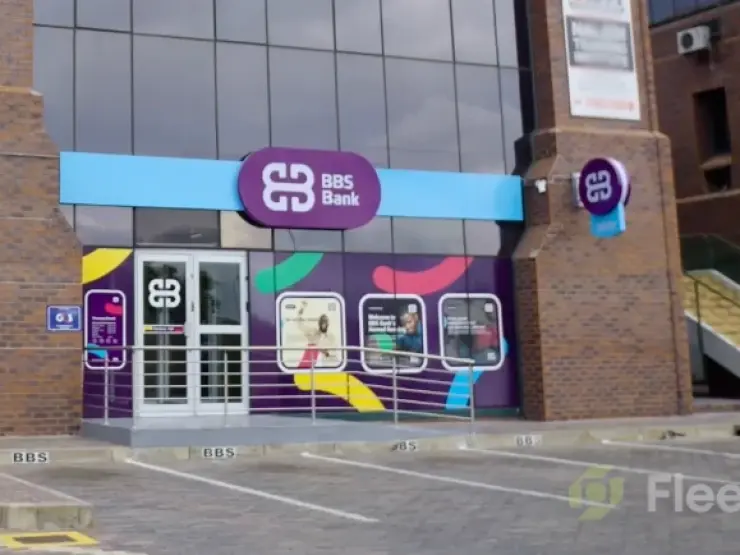 BBS Bank branch exterior with fascia sign and printed window graphics