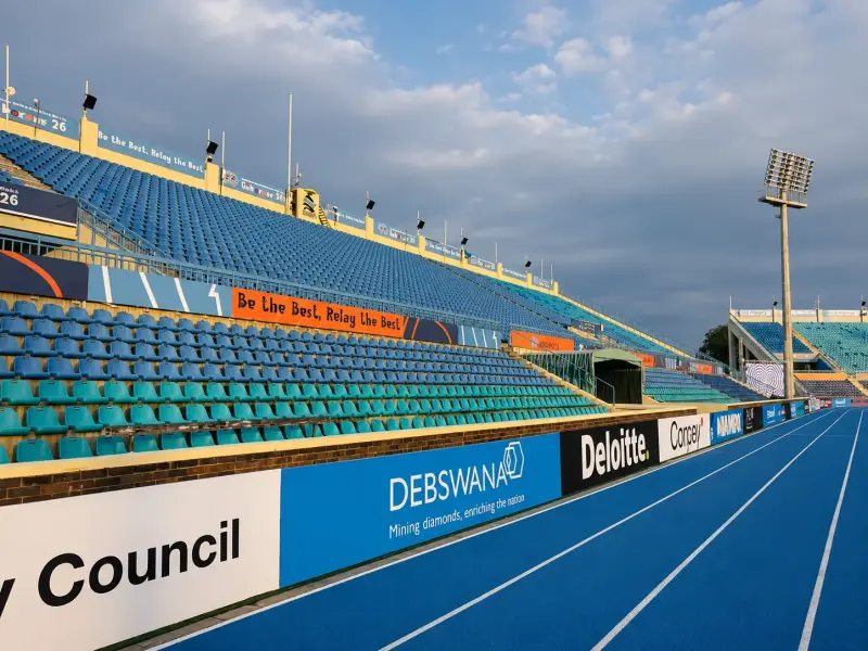 Printed perimeter advertising boards around an athletics track