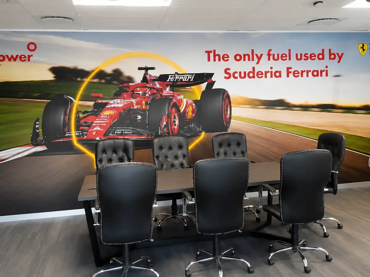 Motorsport-themed wall mural in a Shell branded boardroom